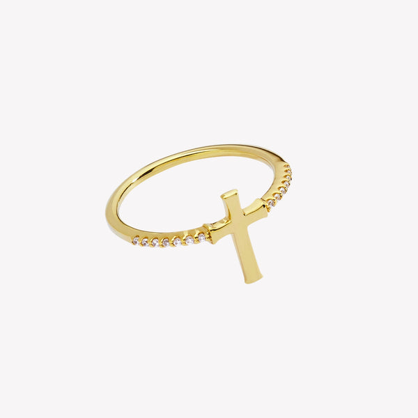 18k gold plated over sterling silver ring showcasing a cross motif centered between seven sparkling micro-set pavé zirconias on either side of the band. From the Insignia Collection by Rizen Jewelry.
