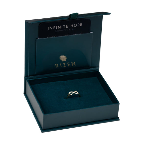 18k gold vermeil Infinite Hope Statement Ring showcases a pavé zirconia ichthys nestled within the infinity symbol with the devotion card in the gift box.