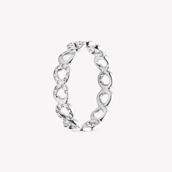 Sterling silver infinity band ring showcases a pavé zirconia ichthys nestled within each infinity loop.