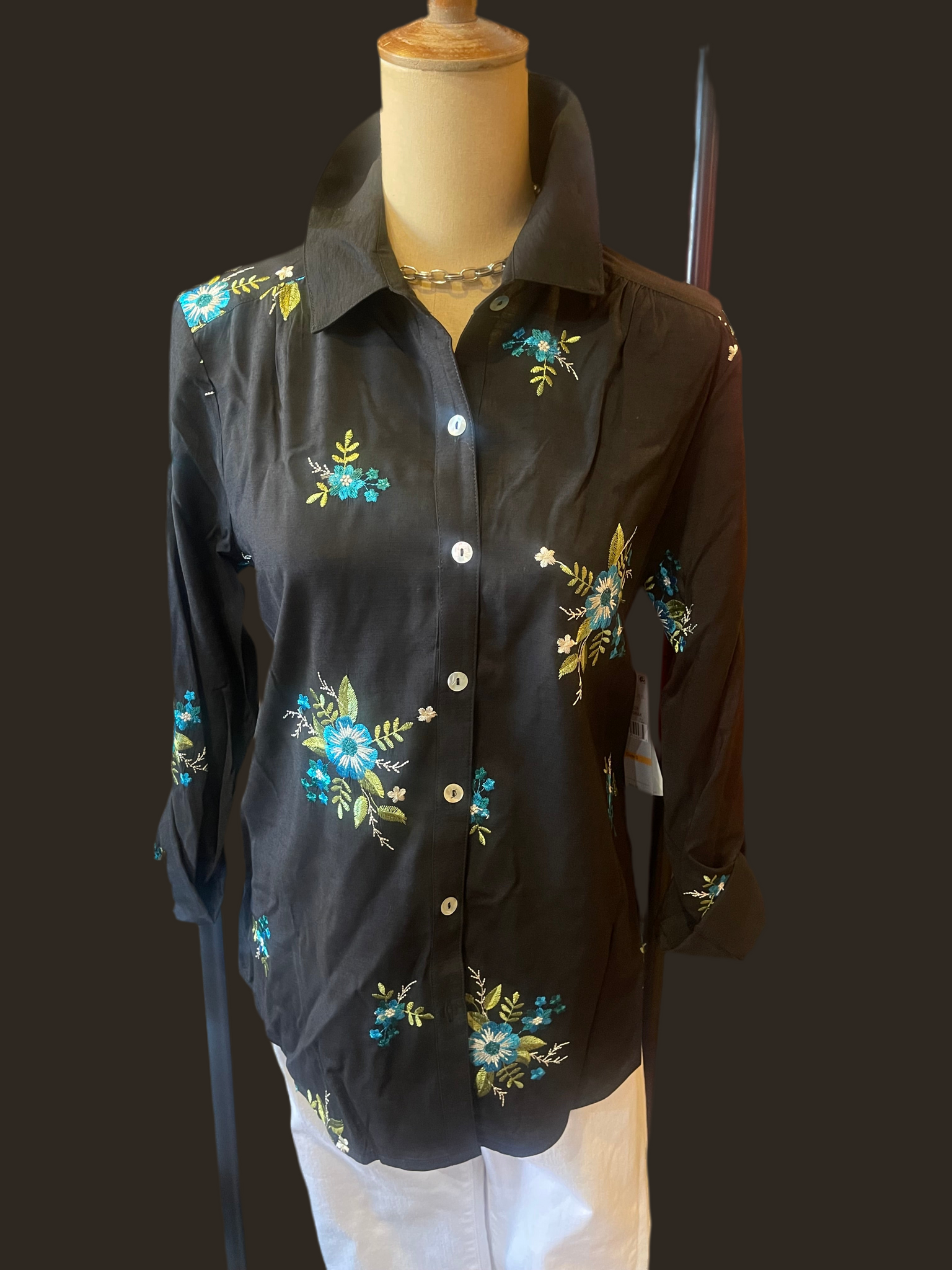 Roll tab long sleeve button front high low shirt with embroidery