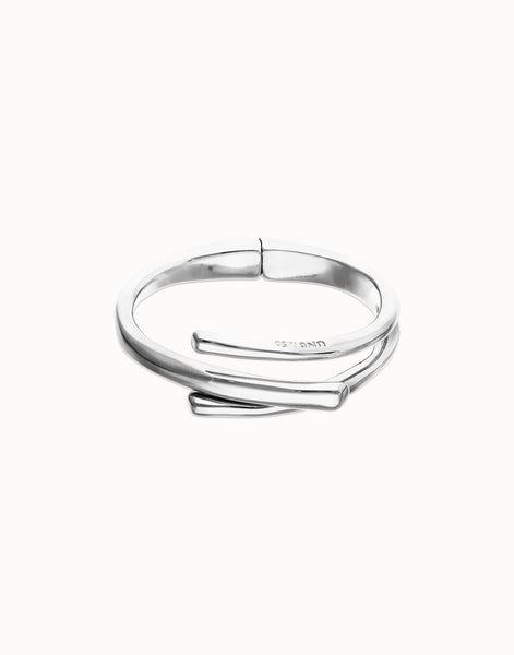 Bangle bracelet with three intertwined organic shapes