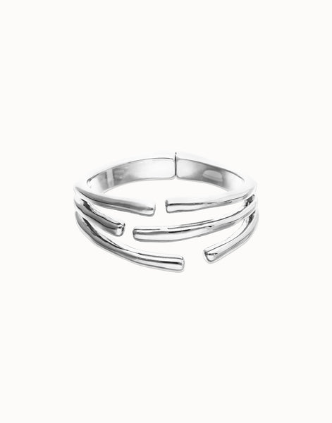 Bangle bracelet with multiple intertwined organic shapes