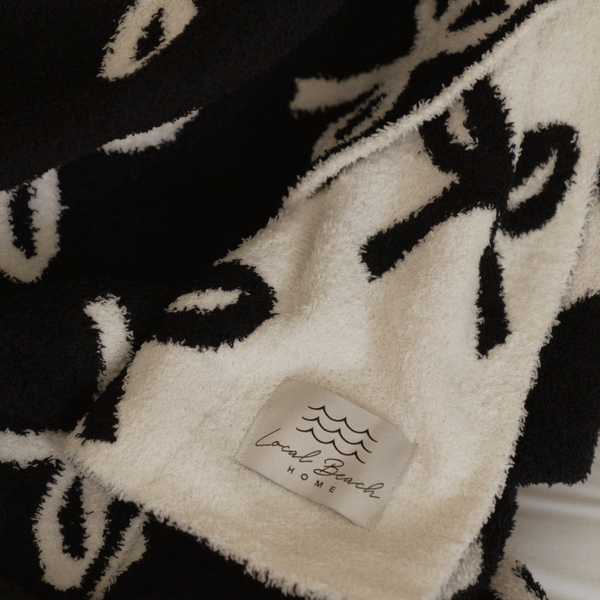 Bow Luxe Home Blanket: Cream/Black