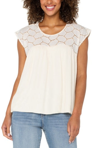 short slv dolman boat neck woven blouse w emb