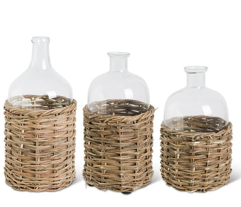 Clear Glass Bottle in Woven Rattan Basket