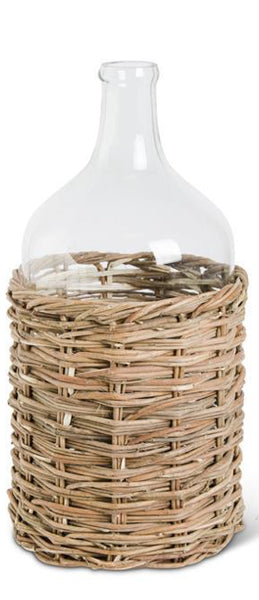 Clear Glass Bottle in Woven Rattan Basket