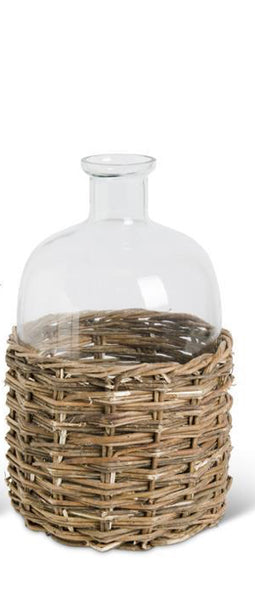 Clear Glass Bottle in Woven Rattan Basket